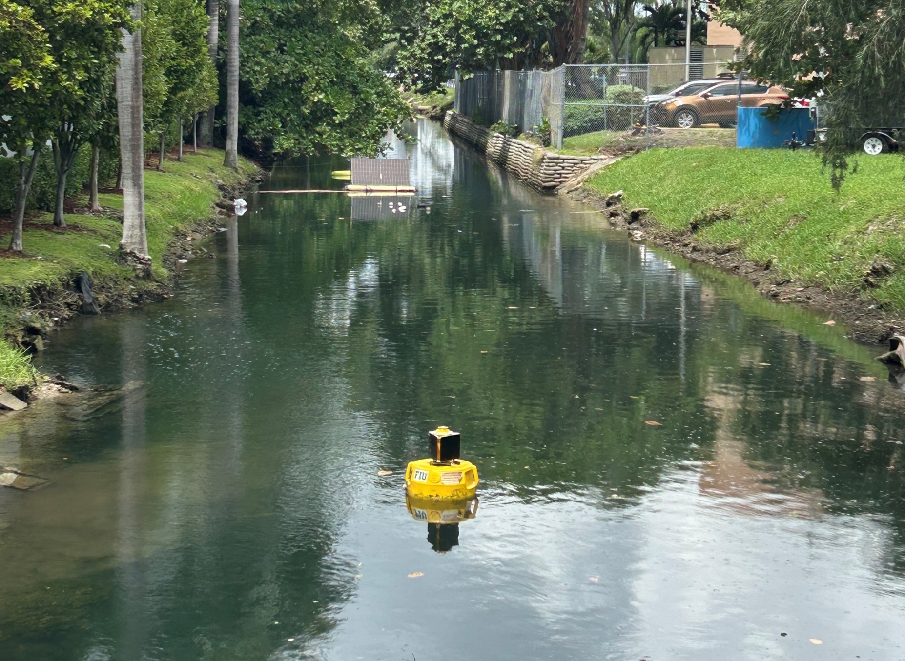 yellow buoy in urban canal